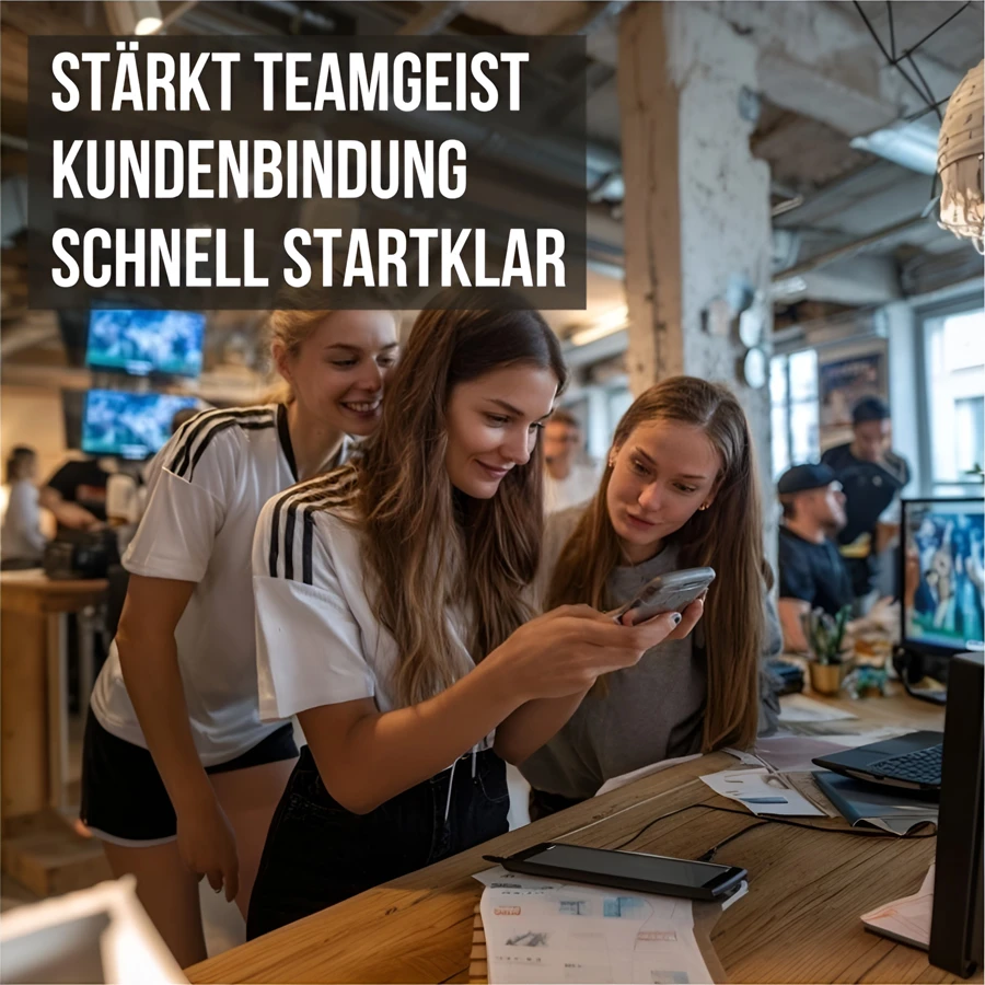 Mitarbeiter verfolgen gemeinsam ein WM Tippspiel im Büro auf dem Smartphone